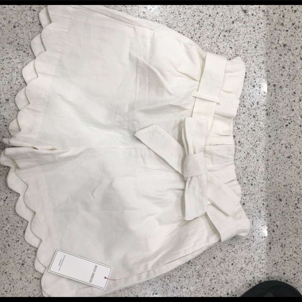 White scalloped shorts